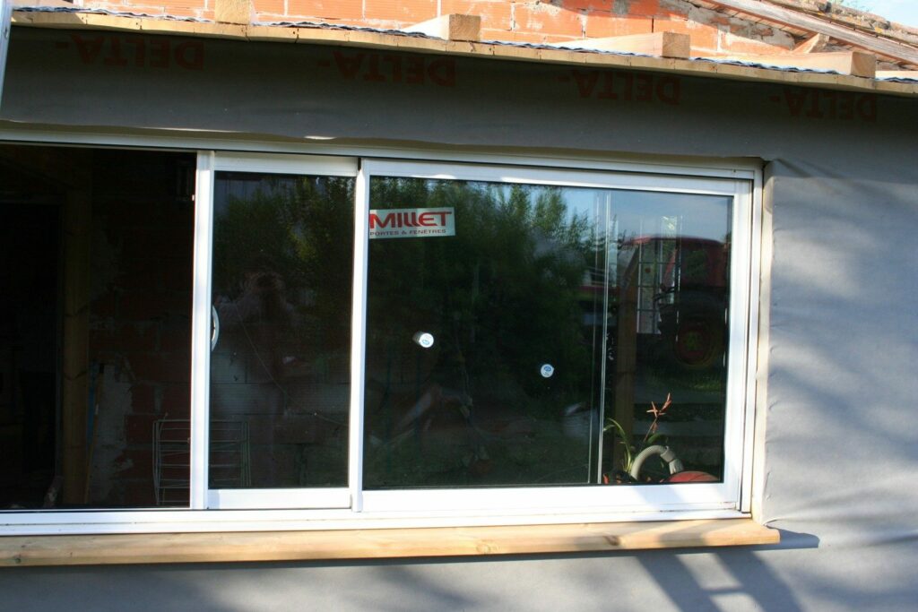 Extension type véranda en ossature bois avec baies coulissantes (5)